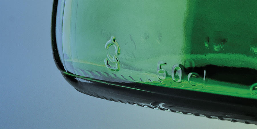 FEVE Glass Hallmark printed on a glass bottle